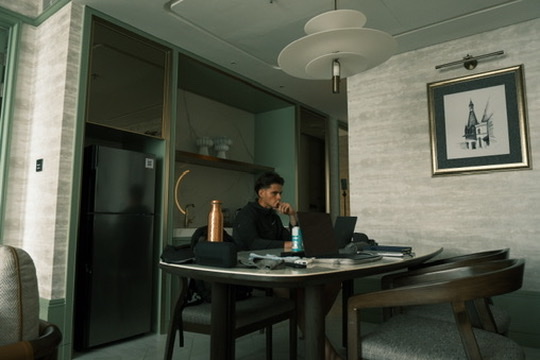 Freddie working at a table
